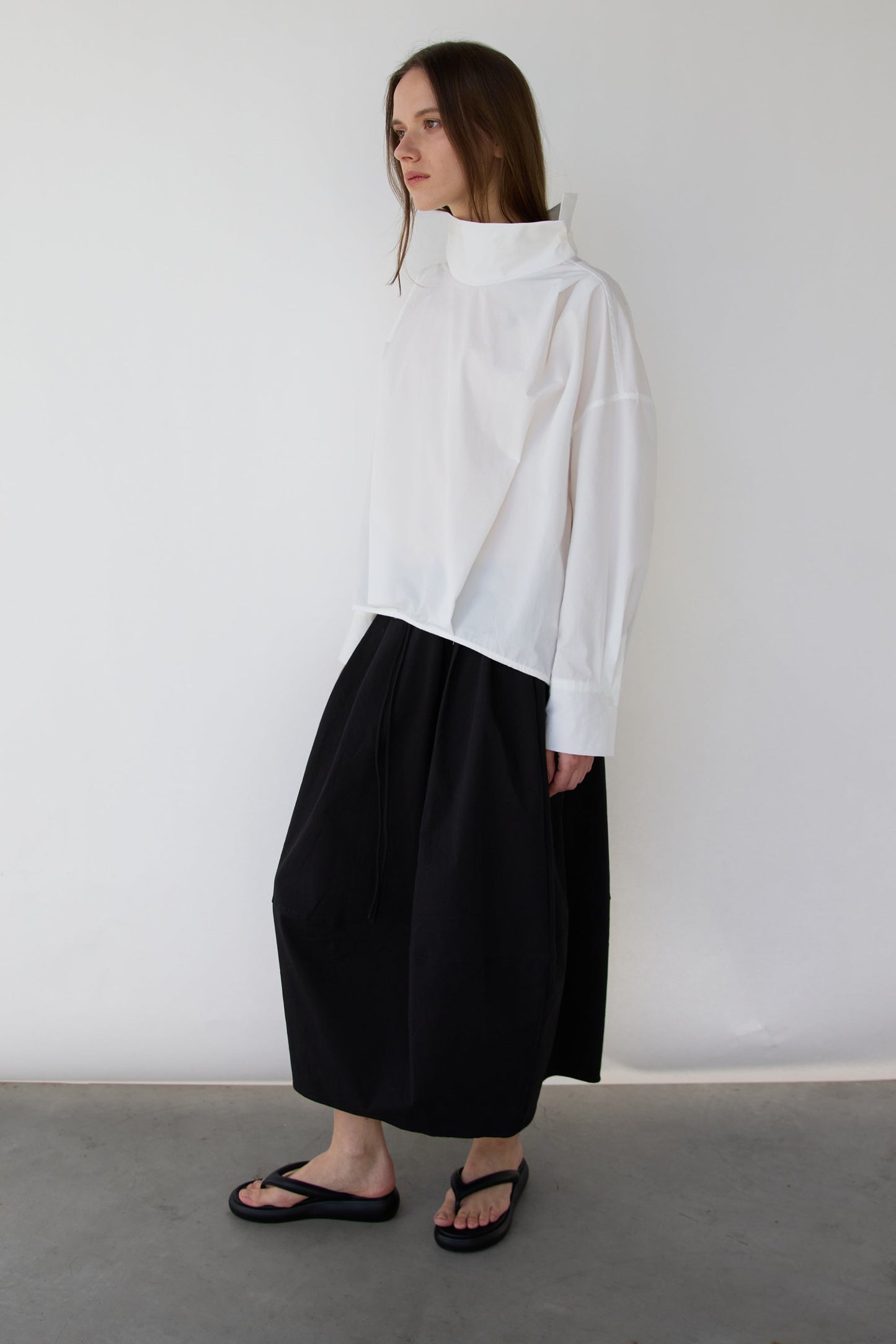 OVERSIZED PLEATED MOCKNECK BLOUSE