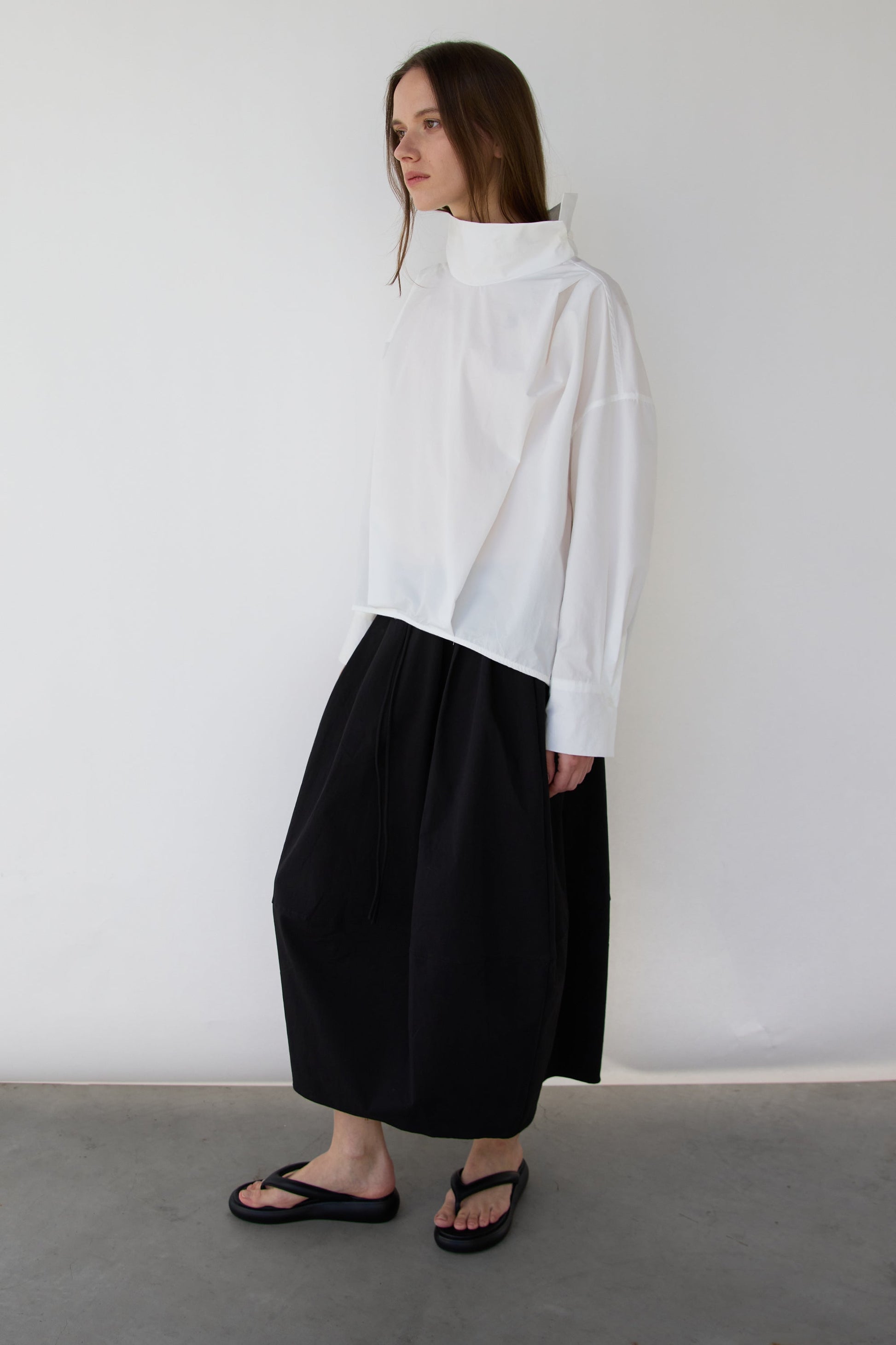 OVERSIZED PLEATED MOCKNECK BLOUSE